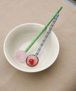 HAY Glass Spoons Round, 2 Pcs -Finnishdesignshop Glass Spoons Twist Glass Spoons Round Rainbow Bowl sand
